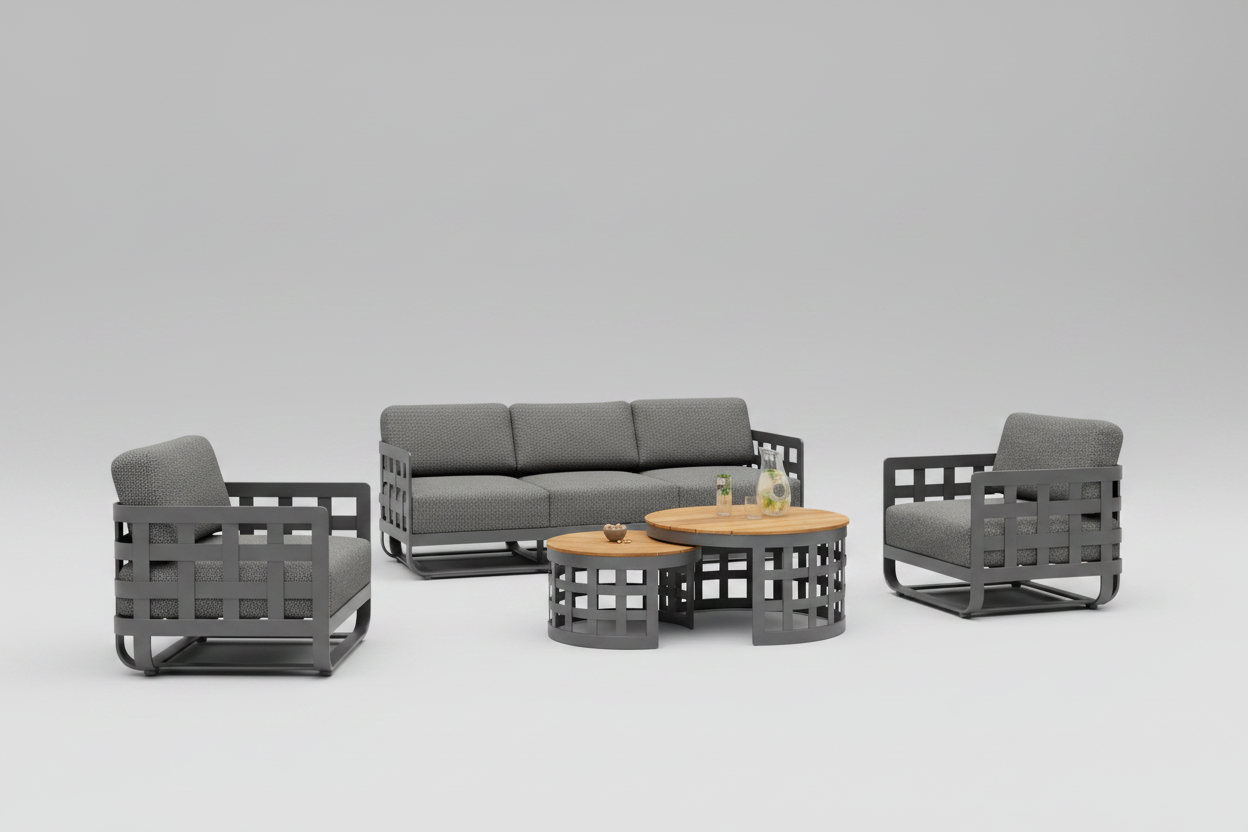 A outdoor lounge setting featuring a charcoal aluminium sofa and coffee tables with a crocheted design, placed on a patio with a body of water and trees in the background.
