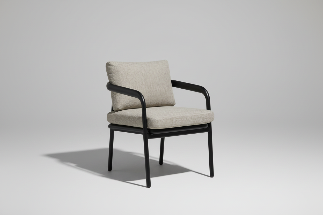 Chair with beige cushions by a poolside in a backyard setting