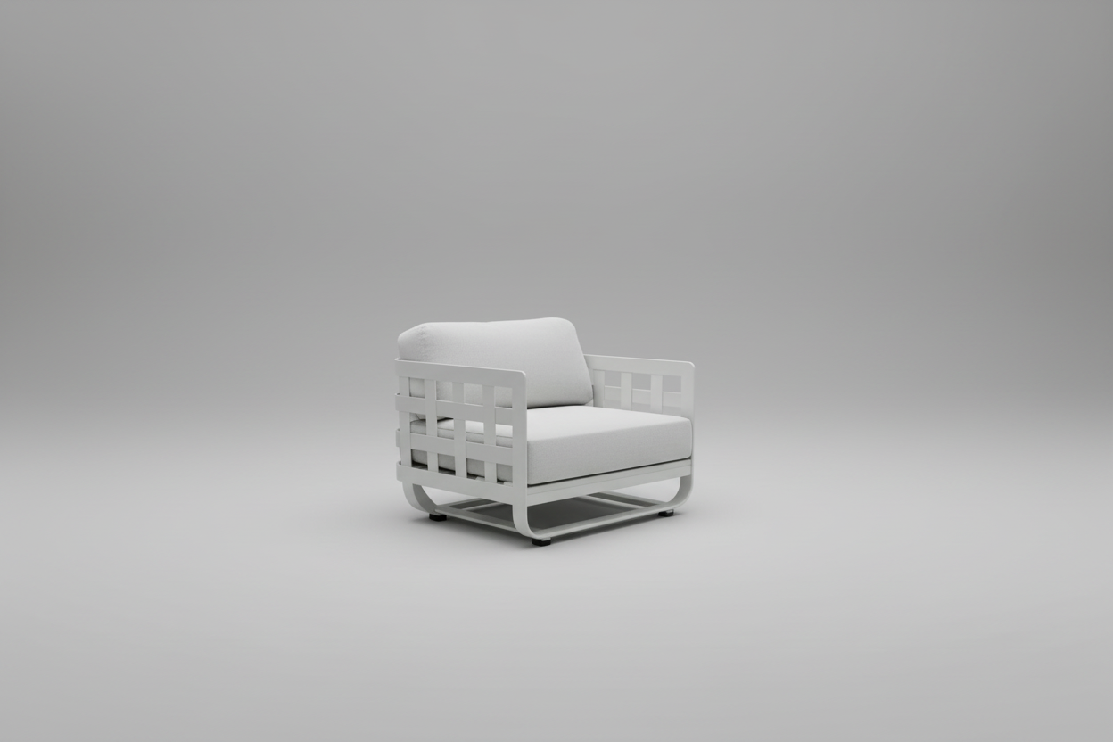 White outdoor chair with cushions by a poolside in a backyard setting