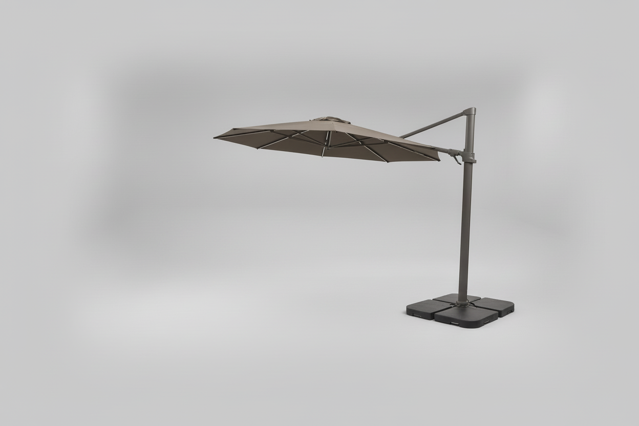 Outdoor patio set with a large umbrella overlooking a waterfront view.