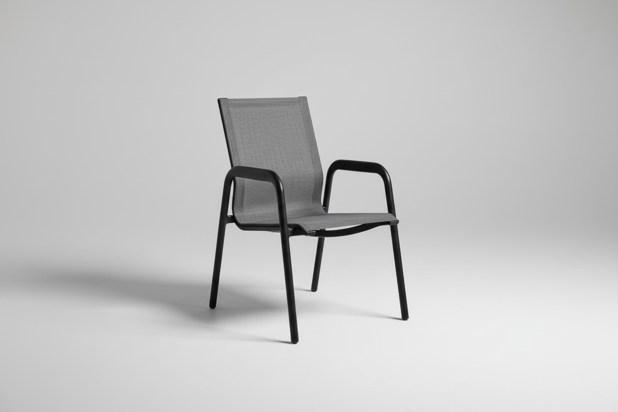 Chair on a patio with a pool and garden in the background