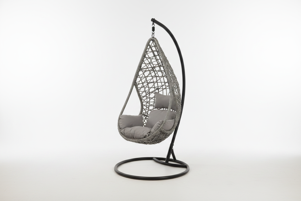 Hanging chair with gray cushions on a stand by a poolside