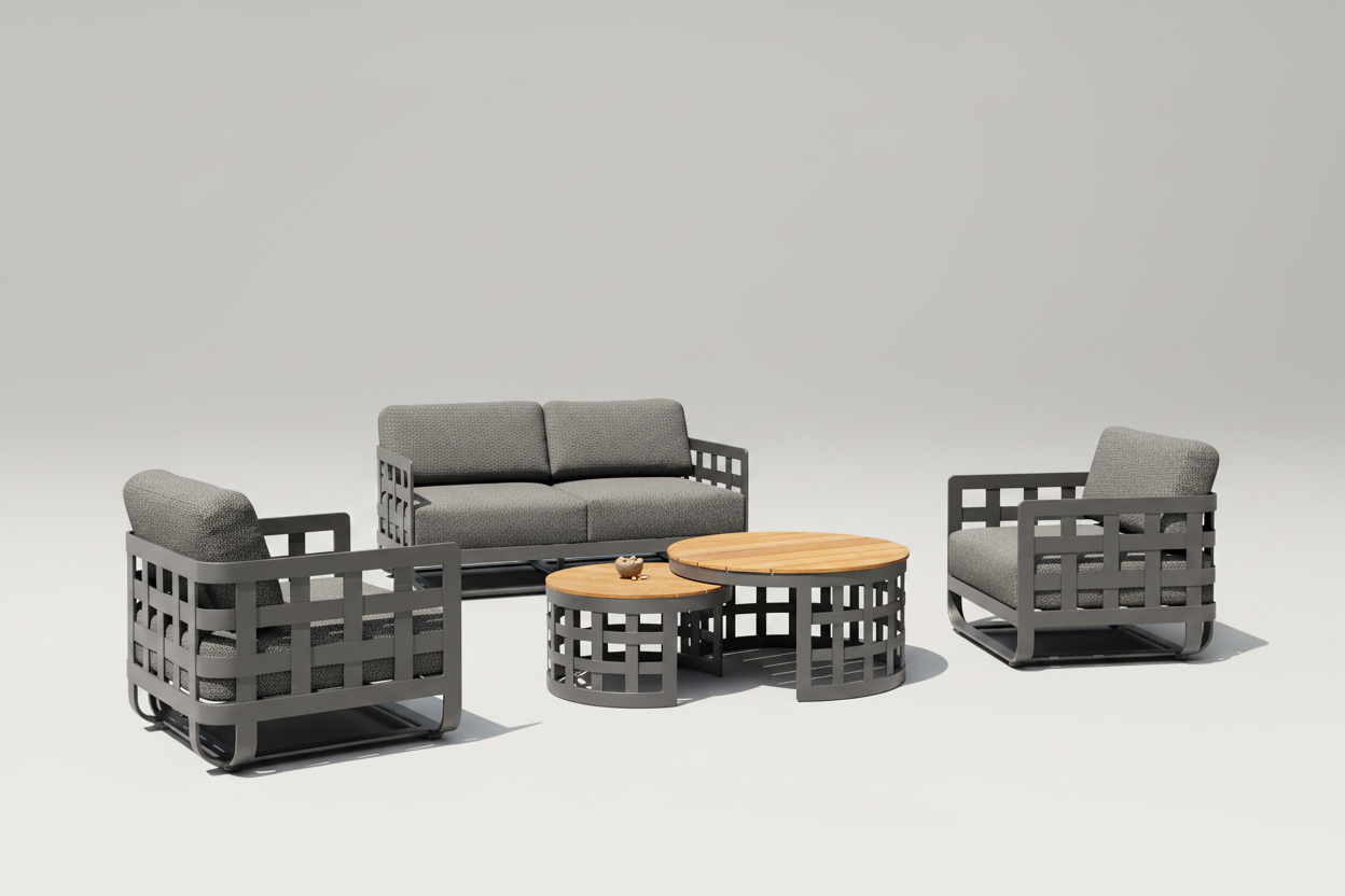 Outdoor patio furniture set with gray cushions by a poolside.