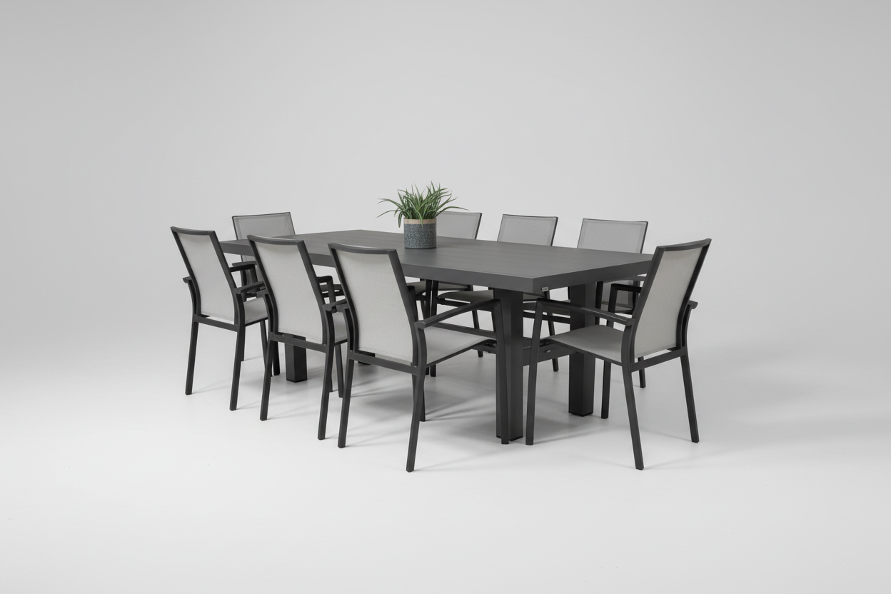 Outdoor dining set with a table and chairs on a wooden floor.