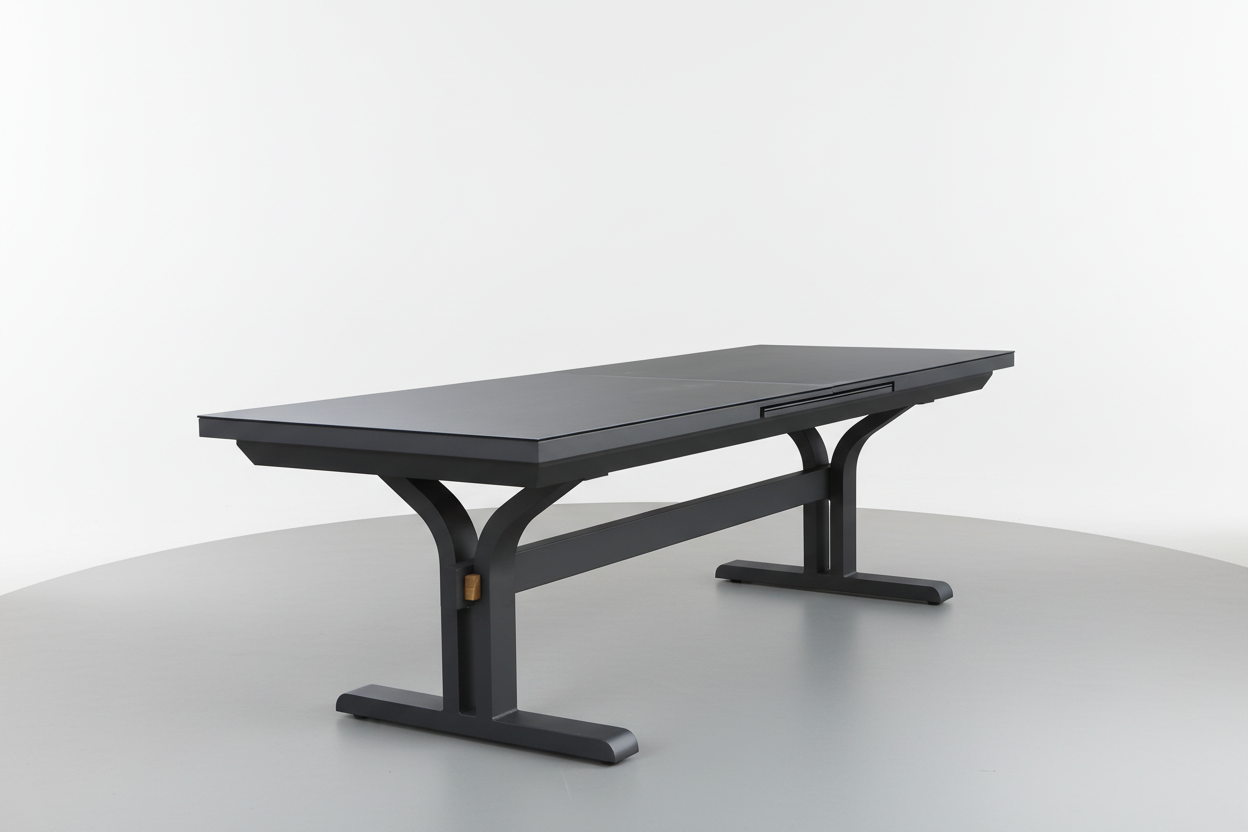 A sleek black outdoor dining table with a ceramic top and aluminium frame, designed for outdoor use.